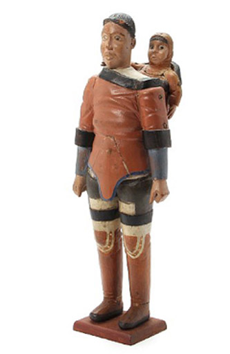  5. Inuit woman and child. Driftwood and paint. 