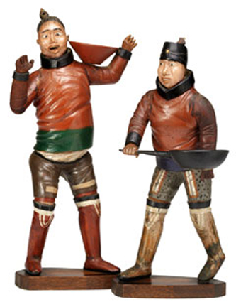 4. Pair of Inuit figures (hunters). Driftwood and paint. 